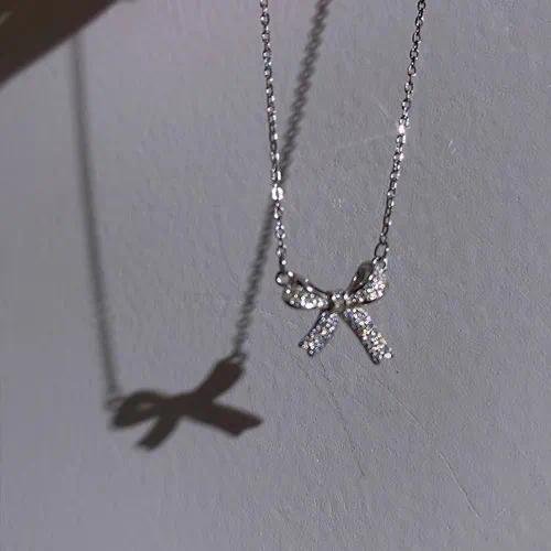 Simple Style Bow Tie Necklace for Women with Electroplated Alloy Pendant Featuring Rhinestones